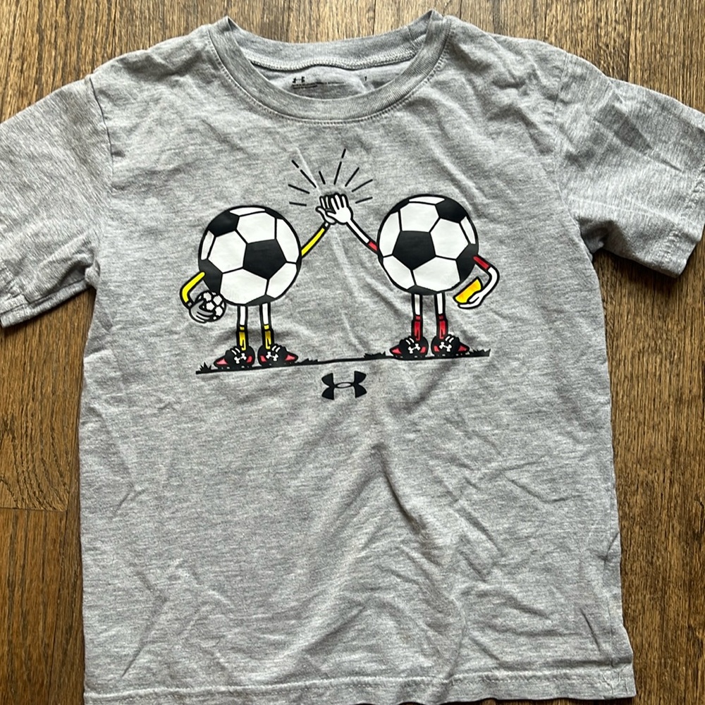 Under Armour size 7 soccer shirt